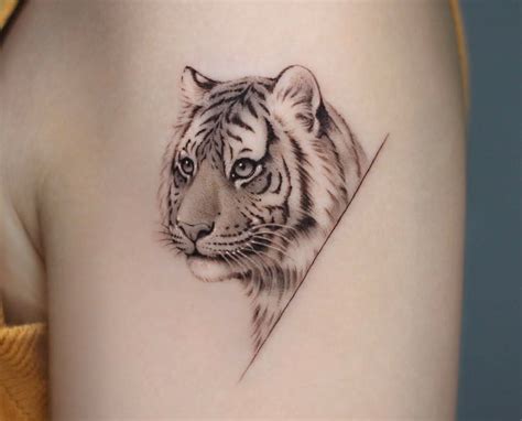 feminine small tiger tattoo|21 Tiger Tattoo Ideas For Ladies